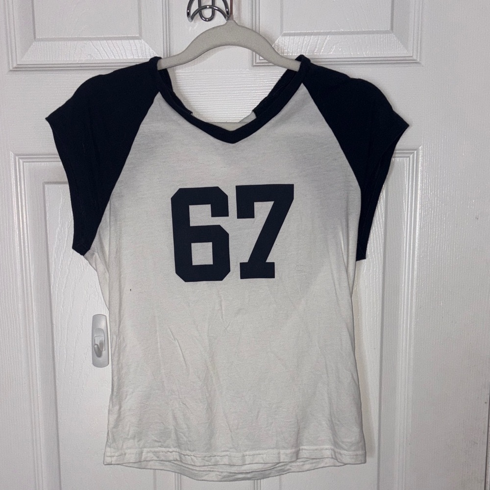 Aritzia TNA soft feels White Tee with Black Raglan Sleeves and '67' Print
